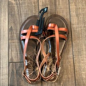 Never worn sandals